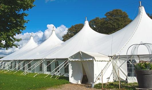 a group of luxury portable restrooms with individual stalls and running water in Fort Hall